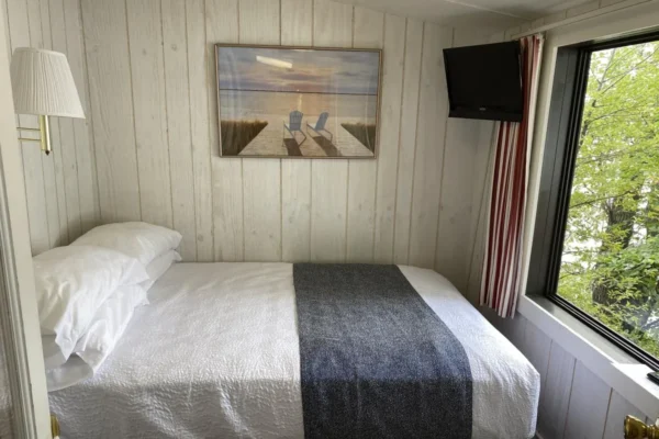 View of the lake-side bedroom with one long-double