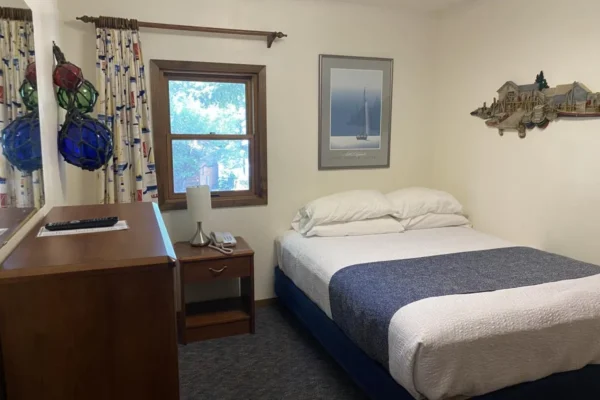 View of the third bedroom upstairs with a queen bed