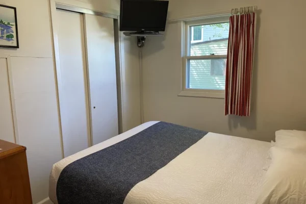 View of one of the bedrooms with a queen bed