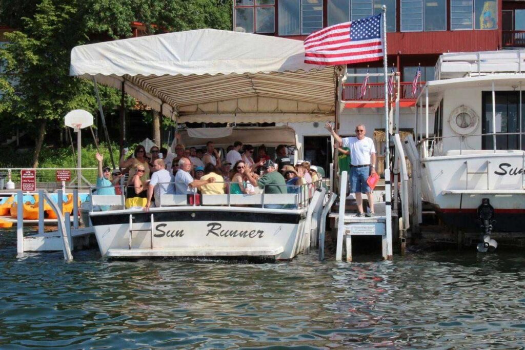 Sun Runner cruise boat at the Main Beach dock, Fillenwarth Beach on West Lake Okoboji